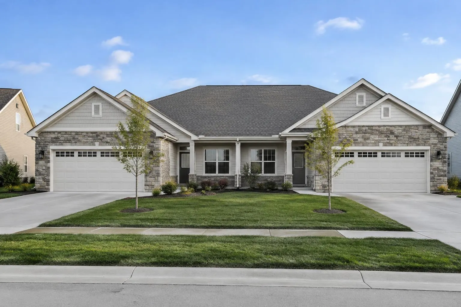 New construction ranch duplex townhome with stone and siding in Palatine, IL